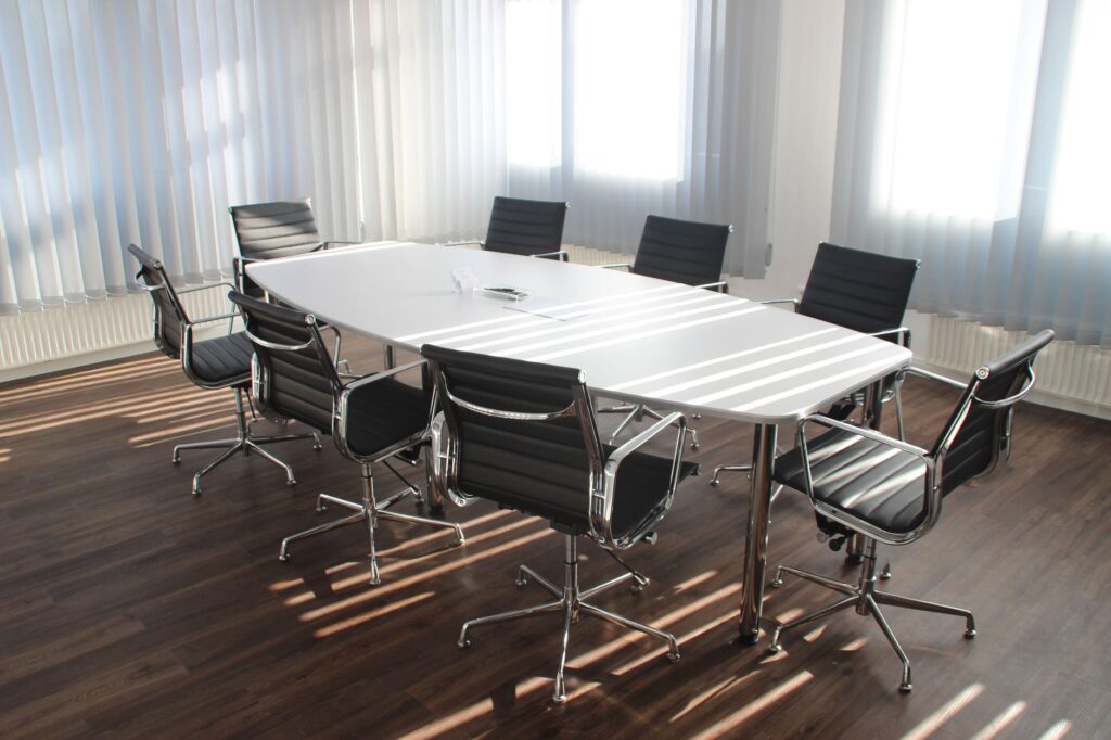 white wooden table with chairs set