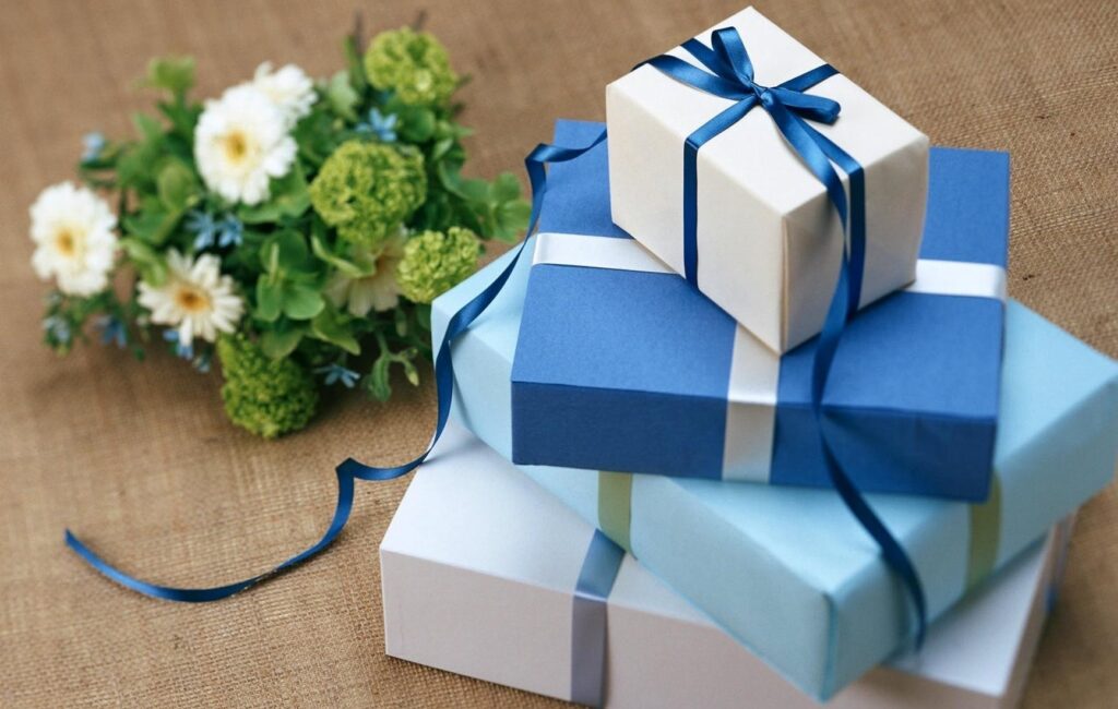 stacked blue colored gift boxes